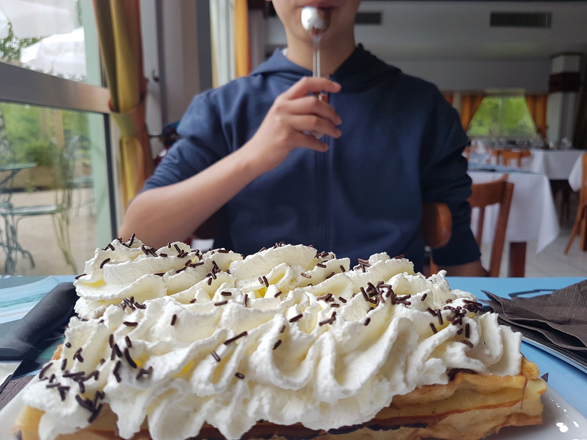 Waffle with chocolate and whip cream at France Miniature